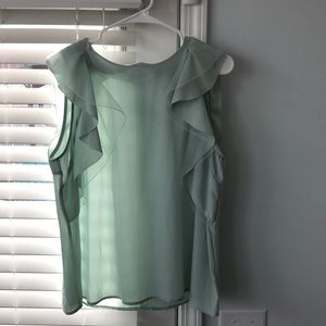 Mint green sleeveless blouse